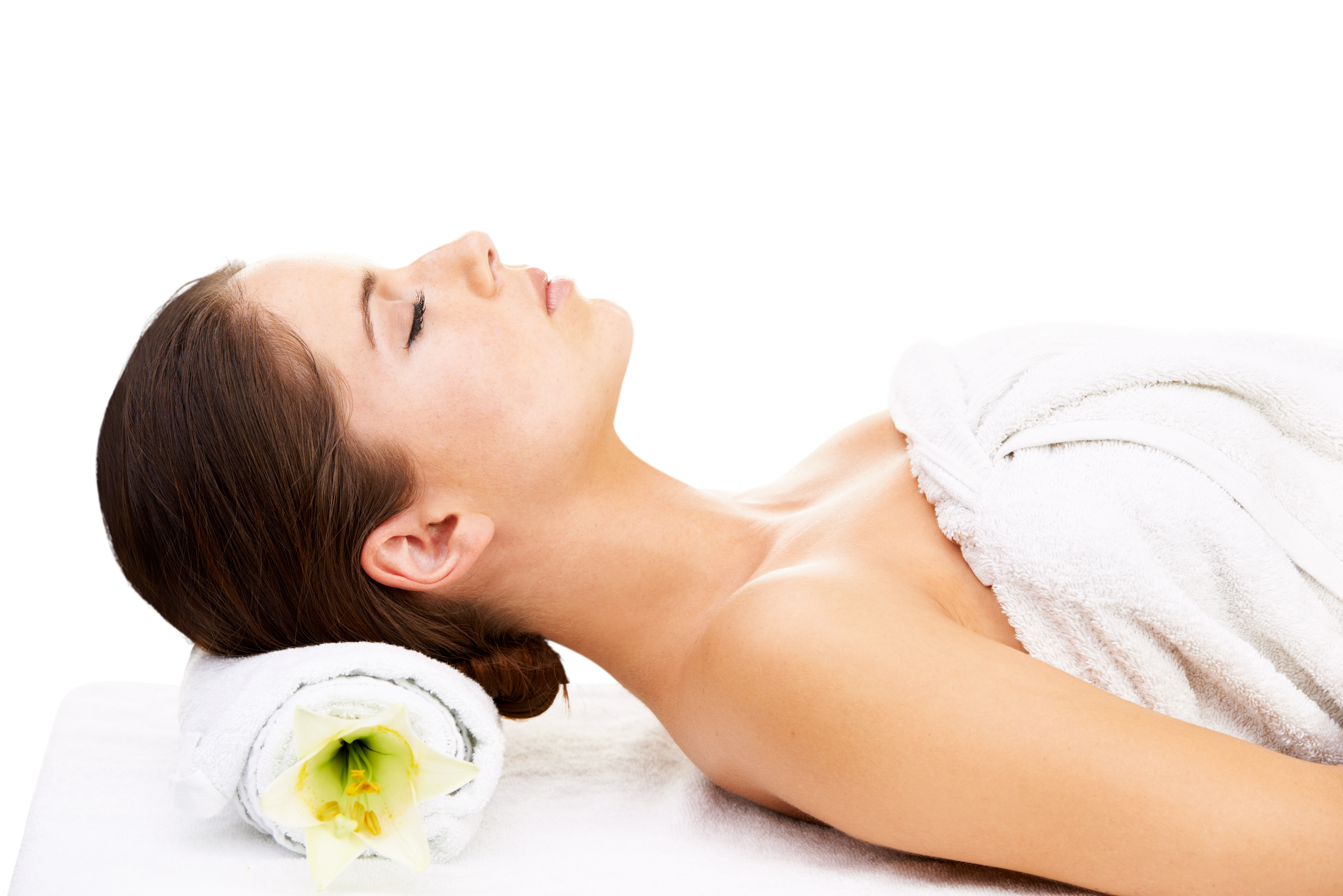 Lady lying in spa bed, with towel